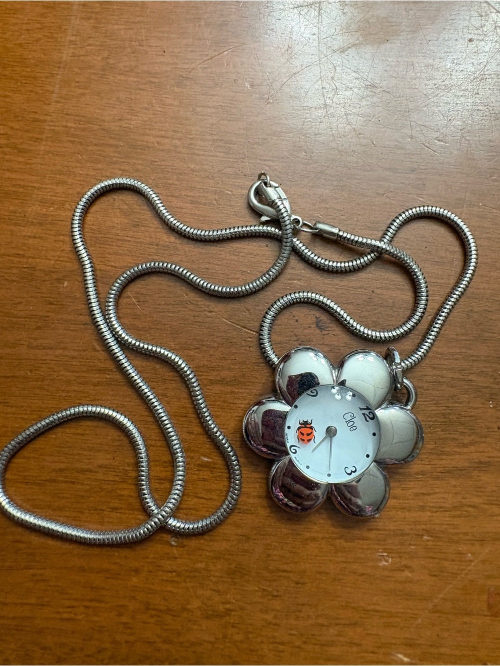 Silver Flower Pendant Necklace with Ladybug Dial